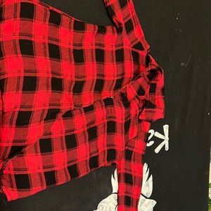 Plaid, long sleeve tee shirt, one button, similar to a cross over design